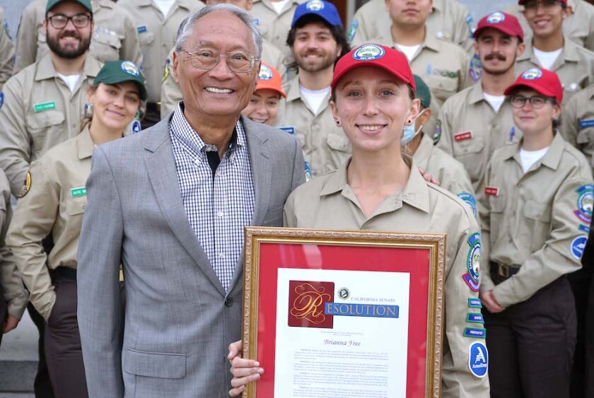 Director Bruce Saito with Corpsmember of the Year Brianna Free at State Capitol.jpg