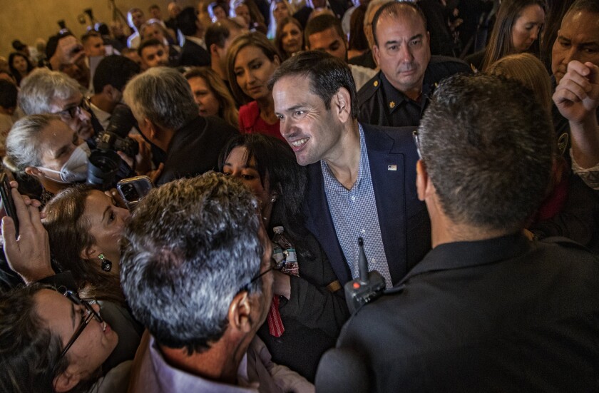 Republican US Senator Marco Rubio shares with supporters during a campaign rally in West Miami