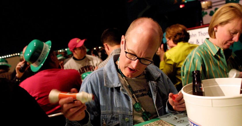 A person playing bingo in 2002 at Lakewood Theater in Dallas.