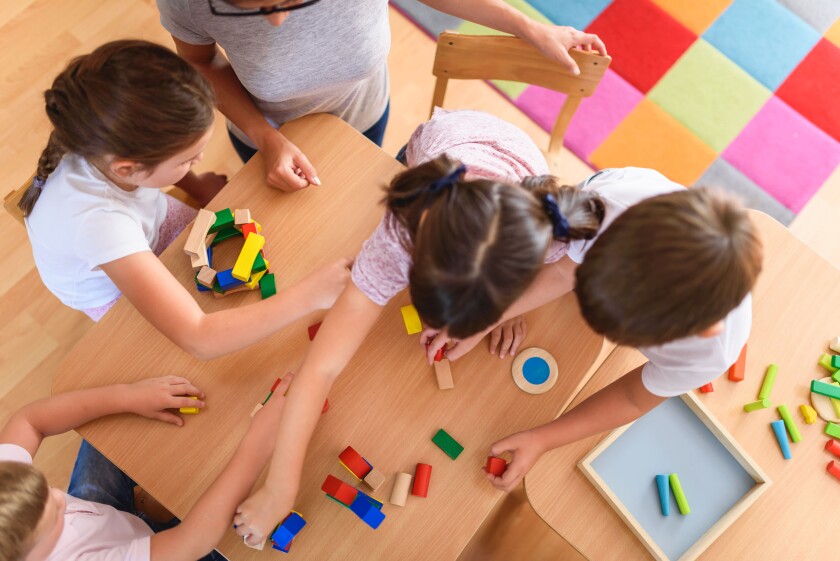 Aerial view of a group of young children playing together.
