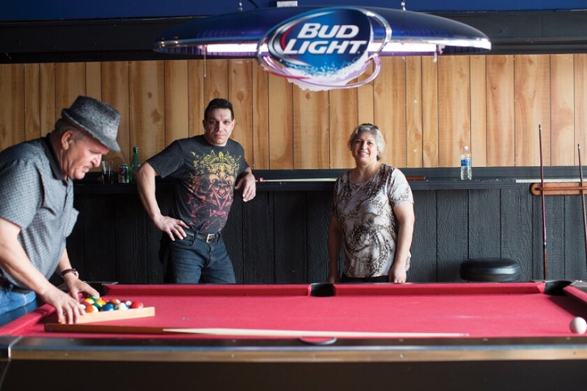 Albanian refugees playing pool