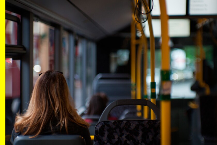 woman+riding+a+bus
