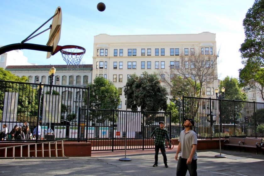 Men playing basketball at San Francisco's Boeddeker Park