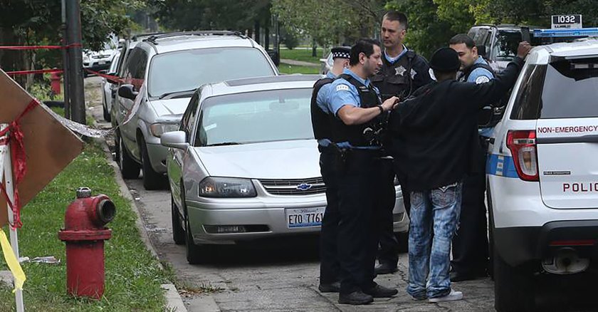 Chicago police stop and frisk a man in 2015.