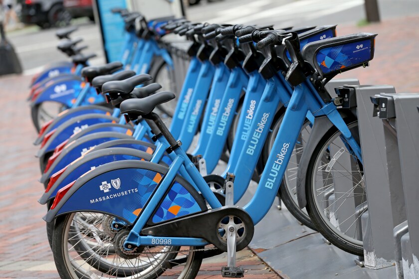 A stack of Blue Bikes in Copley Square, Boston.