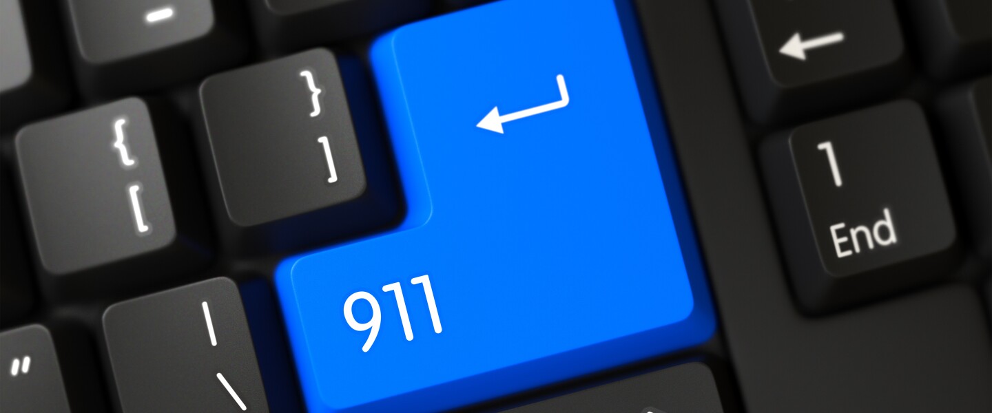 911,On,Computer,Keyboard,Background.,Blue,911,Key,On,Keyboard.