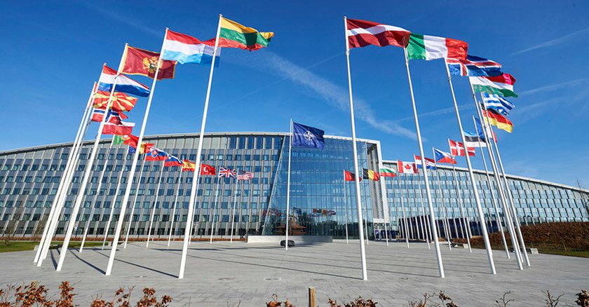 The circle of national flags outside NATO headquarters in Brussels.