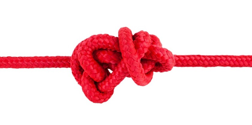 Red rope tied in a knot.