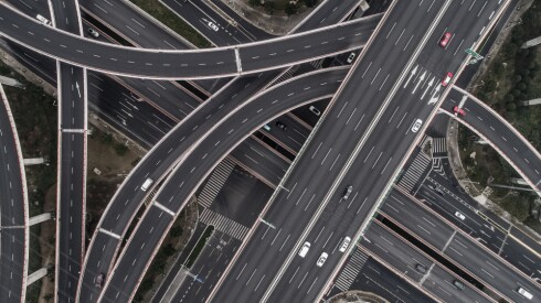 Aerial,View,Of,Highway,And,Overpass,In,City,On,A