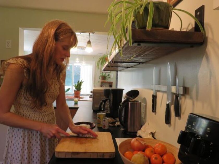 a woman preparing food