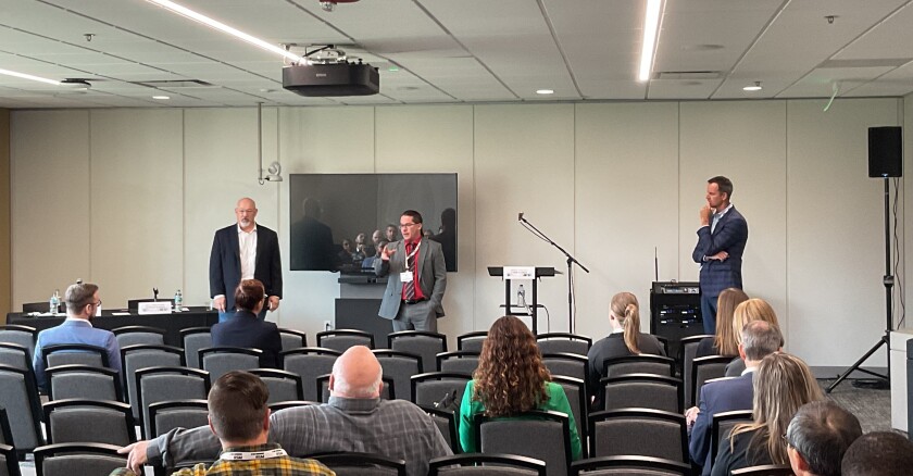 Bryan Langley moderating the “Leadership in the Era of Emerging Technologies” panel featuring Will Armstrong and Sean Maxwell at the Florida IT Leadership Forum in Tallahassee