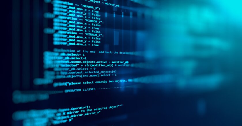 Software code in blue font against a dark background on a screen.