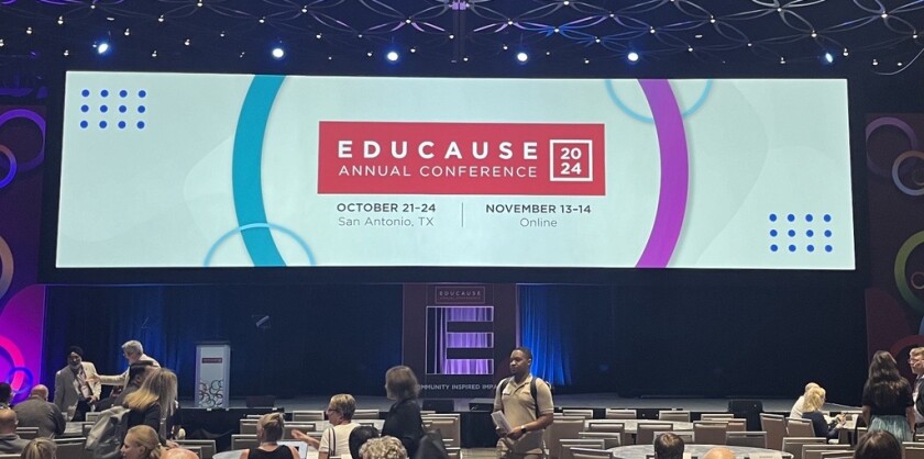 Attendees gather under a large digital screen in a convention center ballroom, during the 2024 Educause Annual Conference, Oct. 21-24 in San Antonio, Texas.