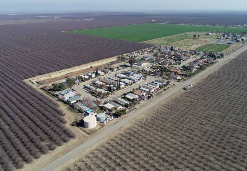 an aerial view of the small farming community of Cantua Creek, Calif.