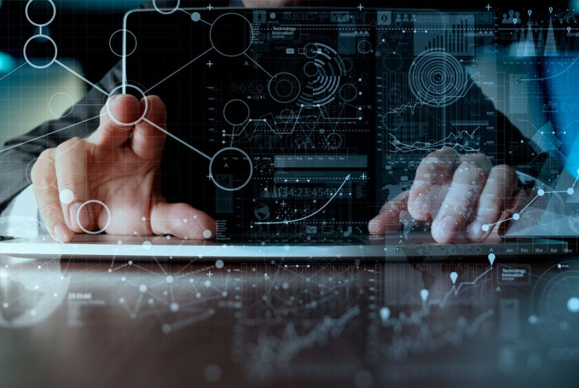 hands+typing+on+a+keyboard+and+interacting+with+a+touchscreen