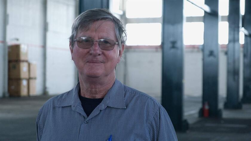 Terry McDonald stands for a portrait