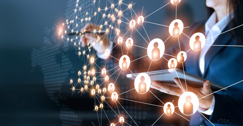 Business person with data points that look like people or avatars. Hi tech image.