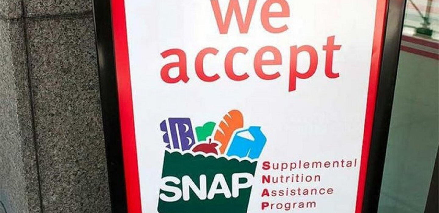 Photograph accompanying Public Law 119-21 turns a 10 percent SNAP error rate into a 15 percent state cost share