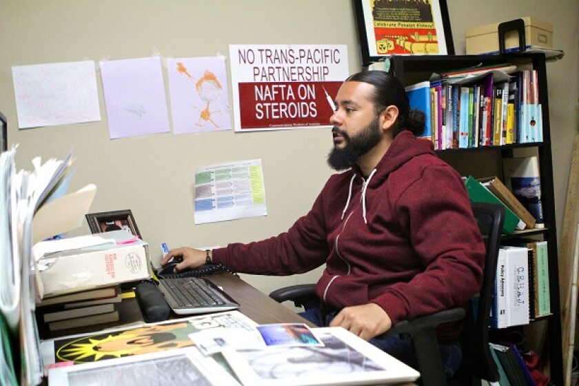 mark-lopez-at-desk.jpg