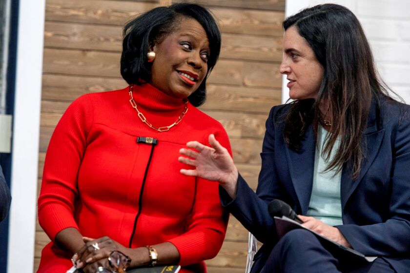 Former Philly City Councilmember Cherelle Parker (left) and former City Controller Rebecca Rhynhart talk