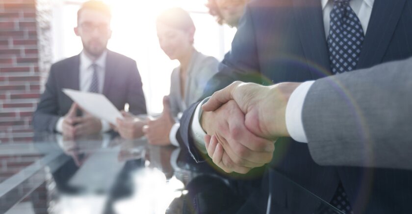 Two businessmen shaking hands