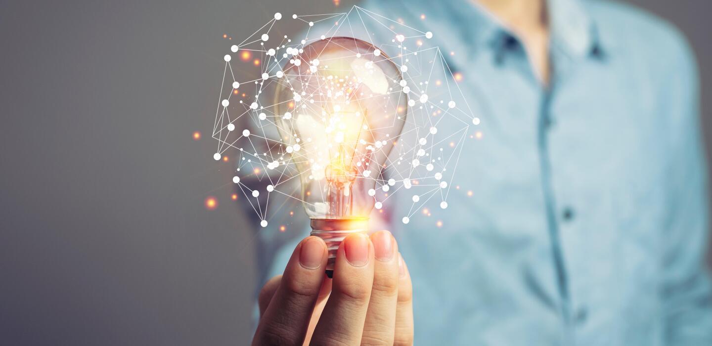 Man holding light bulbs, ideas of new ideas with innovative technology and creativity. concept creativity with bulbs that shine glitter.
