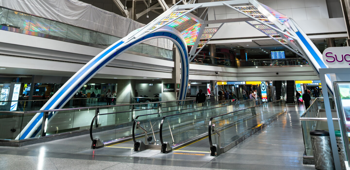 When a Moving Walkway Halts, Tech Gets Repairs in Motion