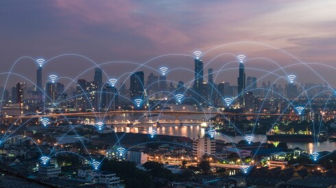 Social,Media,Connection,By,Wireless,Telecommunication,Technology,With,Cityscape,Background