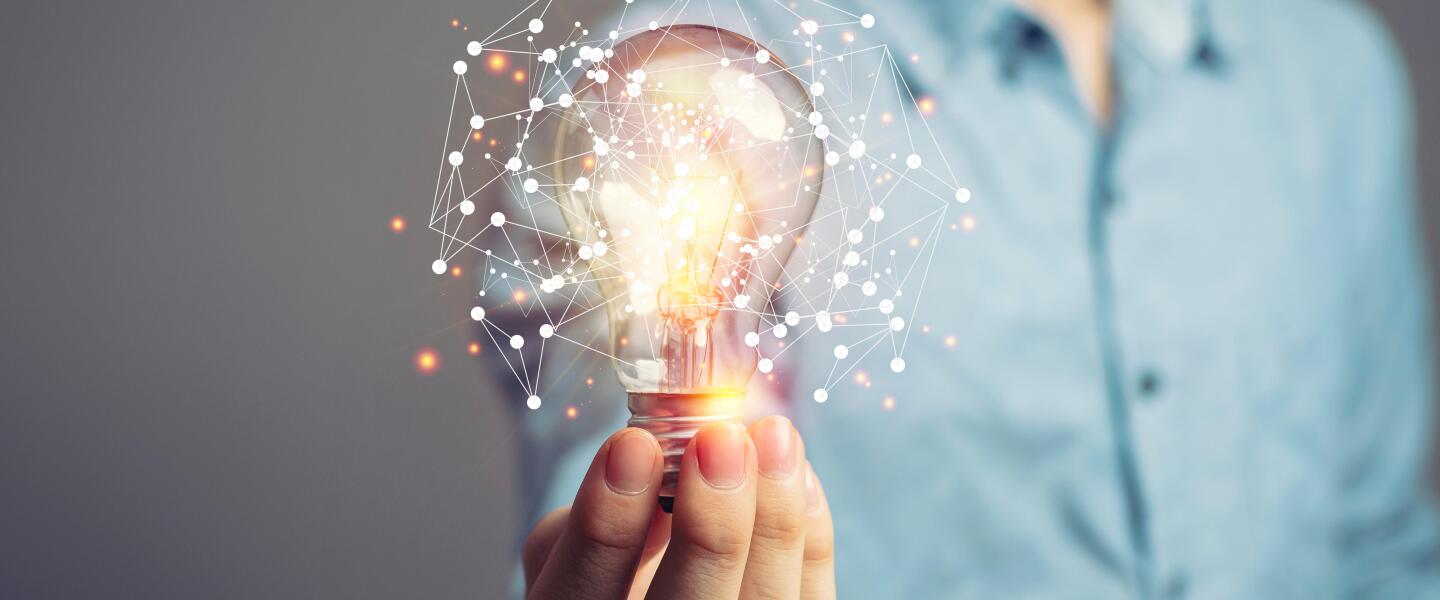 Man holding light bulbs, ideas of new ideas with innovative technology and creativity. concept creativity with bulbs that shine glitter.