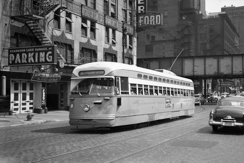 Black and white image of an old streetcar.