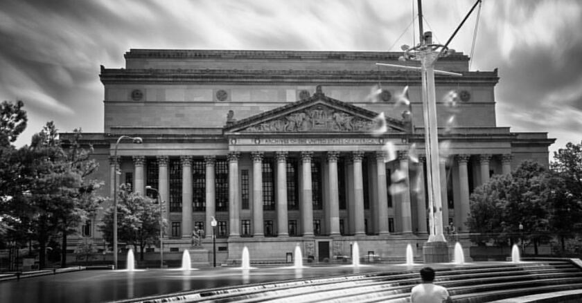 Black and white photo of the National Archives Building.