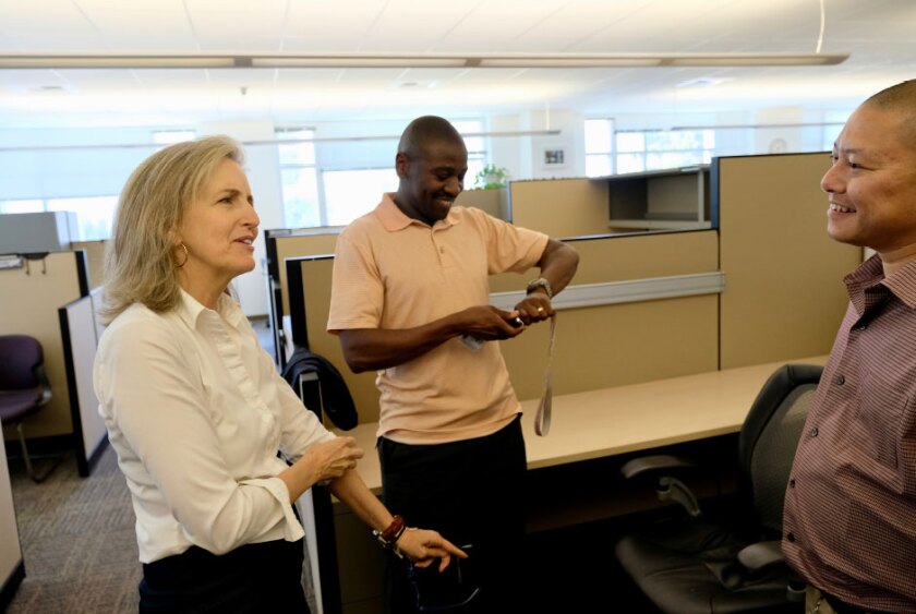 Maria+MacGunigal+with+systems+engineers+Ronnie+Oyula+and+Curtis+Chiuu