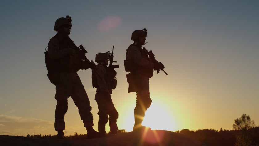Squad,Of,Three,Fully,Equipped,And,Armed,Soldiers,Standing,On