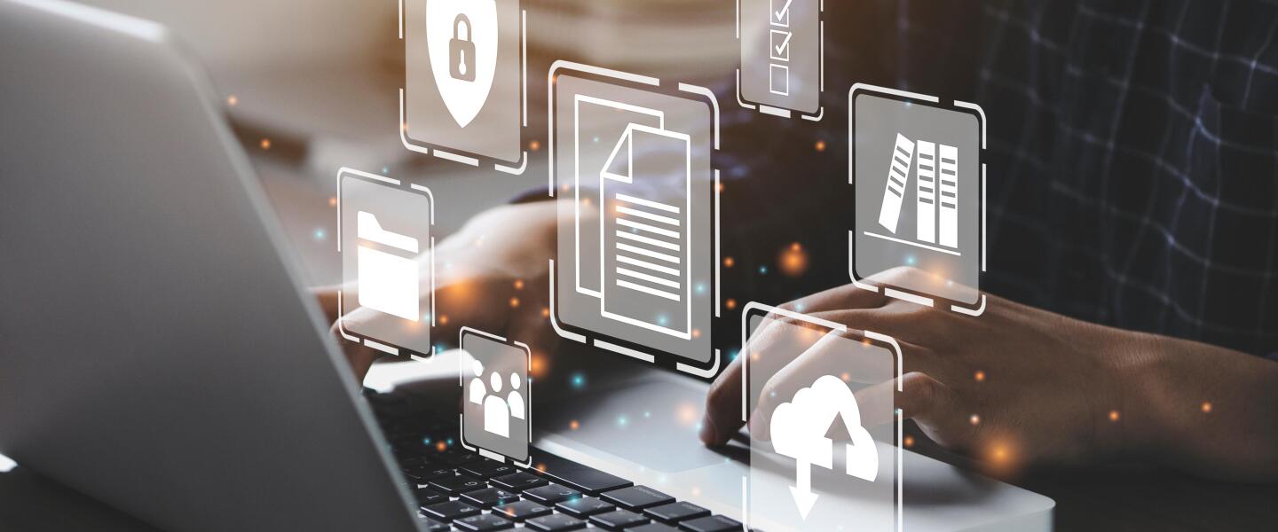 Businessman using a computer to document management concept, online documentation database and digital file storage system or software, records keeping, database technology, file access, doc sharing.