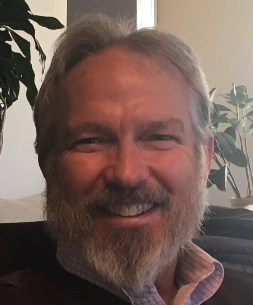 headshot of Ken Boykin smiling