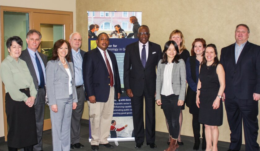 The+group+of+local+CIOs+in+2015+with+Robert+Jones%2C+president+of+the+University+at+Albany.