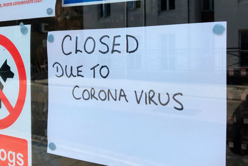 sign+in+window+reading+closed+due+to+coronavirus