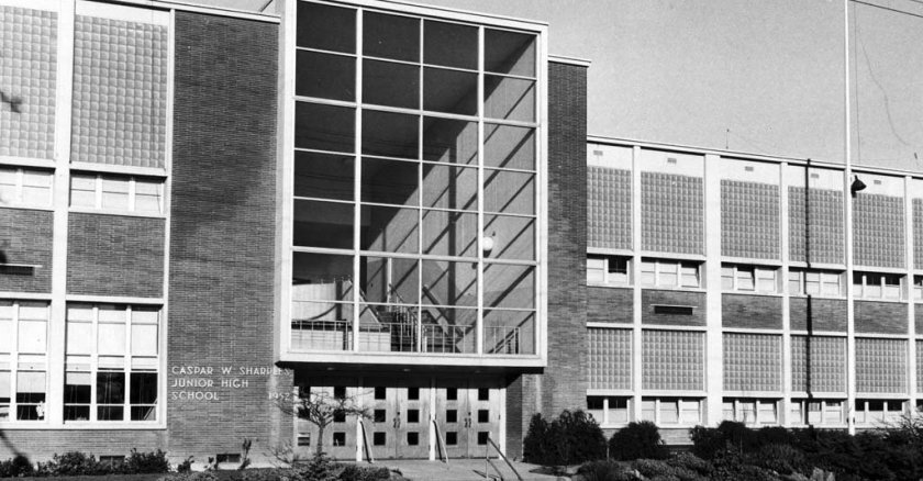 A black and white image of the front of Seattle’s Caspar W. Sharples School, now known as Aki Kurose Middle School.