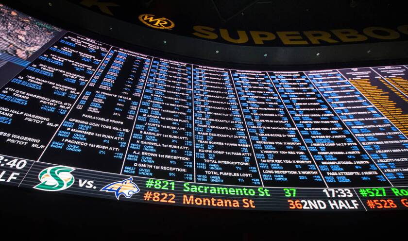 Prop bets are posted on a large screen at the Westgate SuperBook for Super Bowl 59 between the Kansas City Chiefs and Philadelphia Eagles.