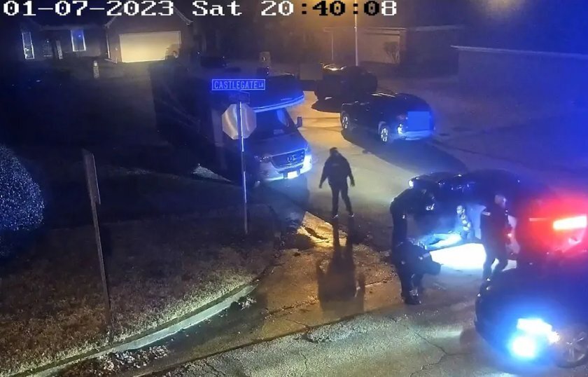Surveillance camera image showing Tyre Nichols in the hands of police