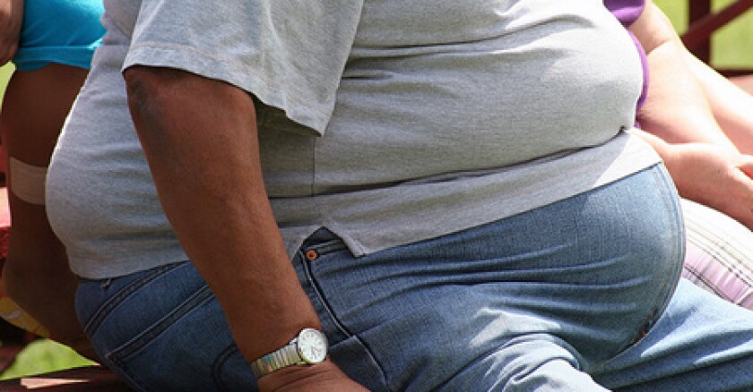 Obese man sitting