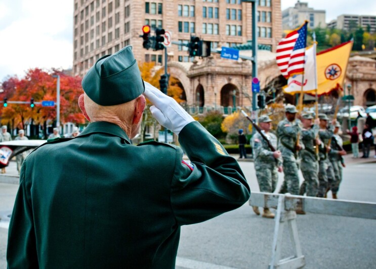 Veteran saluting at a military parade