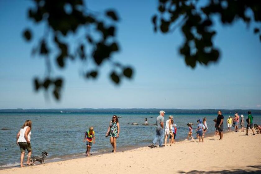 People at the Old Mission Lighthouse Park's beach