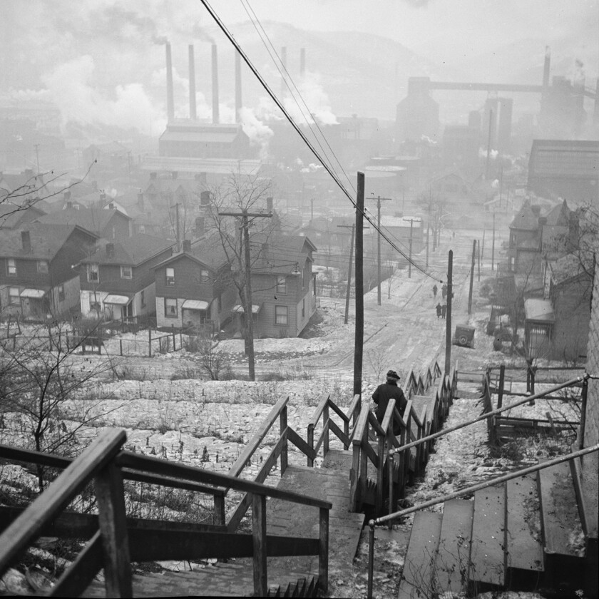 A black and white photograph of the steps leading to the old Mill District in Pittsburgh in 1941.