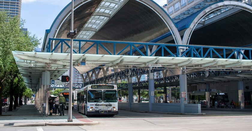 An April 2017 view of the Houston Metro, an arched construction for buses to stop under.