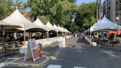 A normally busy two-way street in Sacramento, Calif., has been partially closed to through traffic