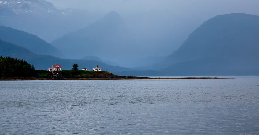 remote village on the coast of a river in Alaska
