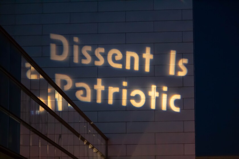 Dissent is patriotic sign at rally
