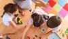 Aerial view of a group of young children playing together.