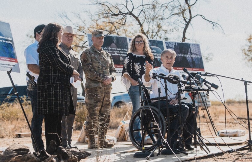Texas Gov. Greg Abbott unveils a billboard campaign warning immigrants of the risks of traveling from Central America and Mexico to Texas in a news conference in Eagle Pass, Texas, Dec. 19, 2024. (Office of Texas Gov. Greg Abbott/TNS)